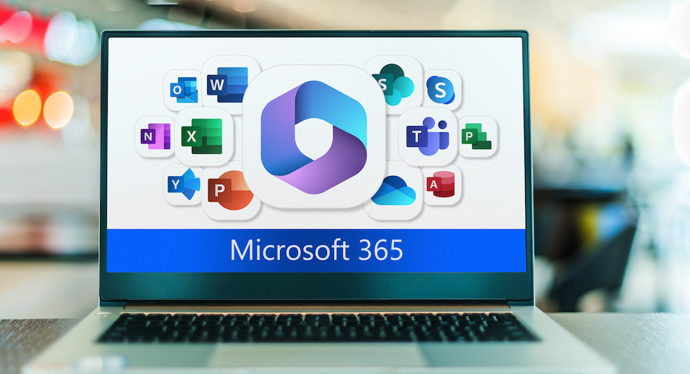 Laptop computer displaying logos of Microsoft Office 365