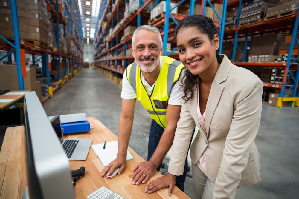 Managed print services provider visiting manufacturing customer in warehouse